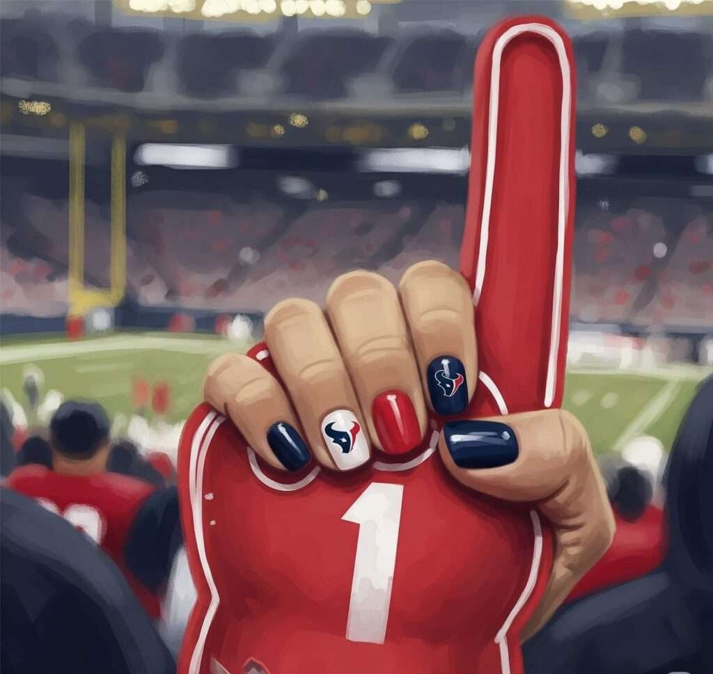 Houston Texans fan: A close-up of a themed manicure and foam finger at a game.