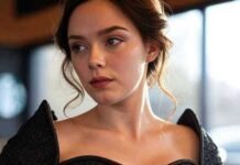 Neo-Medievalism: The Fantasy-Inspired Fashion Trend Taking Over 2025 A person wearing a black Neo-Medieval corset with intricate designs, blending Game of Thrones and Renaissance fair styles, at a modern Starbucks in 2025.